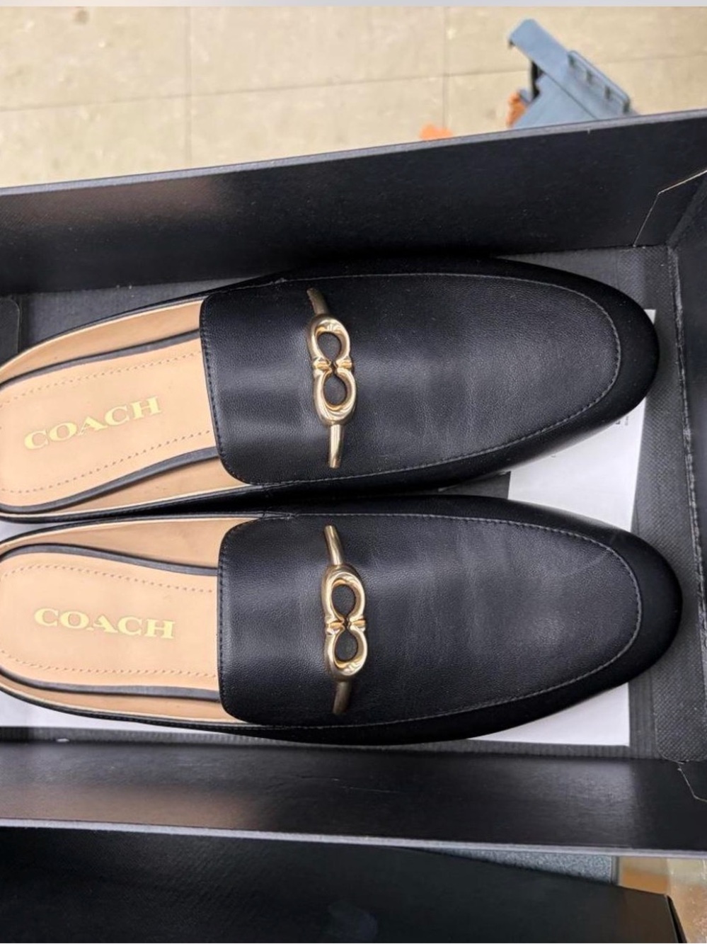 Coach Black Leather Women's Slip-On Loafers with Gold Hardware